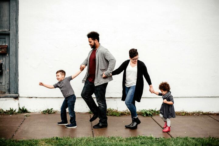 A family walking together holding hands