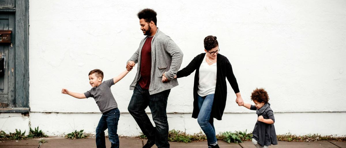 family-walking-holding-hands