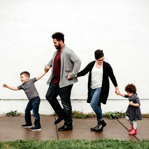 family-walking-holding-hands