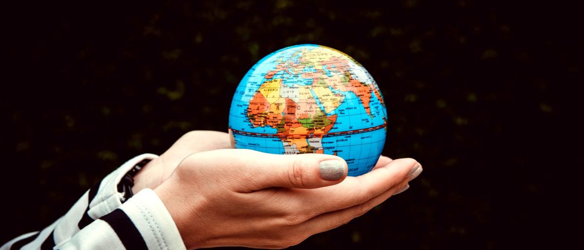 tiny-globe-in-hands