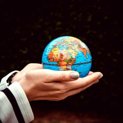 tiny-globe-in-hands